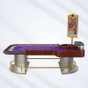 High-end deluxe roulette gaming table with purple baize, golden frame, integrated odds monitor and premium wheel