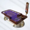 Luxury custom roulette table featuring purple felt betting grid, gold-trimmed edges, electronic payout display & crystal ashtray
